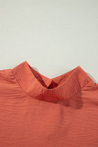 Russet Orange Swiss Dot Balloon Sleeve Mock Neck Blouse