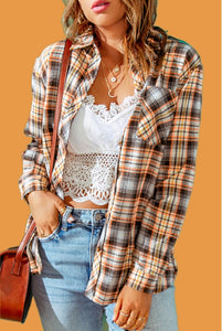 Classic fall colored plaid fabric in browns, orange and yellow. This flannel shirt has button up design with chest pocket. Warm and cozy for cooler weather. Wear alone or grab a cute tank or tee to throw on underneath for a fun casual look. Is roomy for sizes and has nice weight.  Cotton 35% Polyester 65% No stretch. 