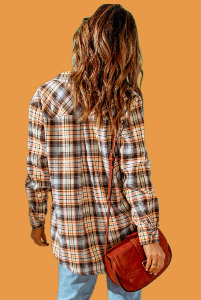 Classic fall colored plaid fabric in browns, orange and yellow. This flannel shirt has button up design with chest pocket. Warm and cozy for cooler weather. Wear alone or grab a cute tank or tee to throw on underneath for a fun casual look. Is roomy for sizes and has nice weight.  Cotton 35% Polyester 65% No stretch. 