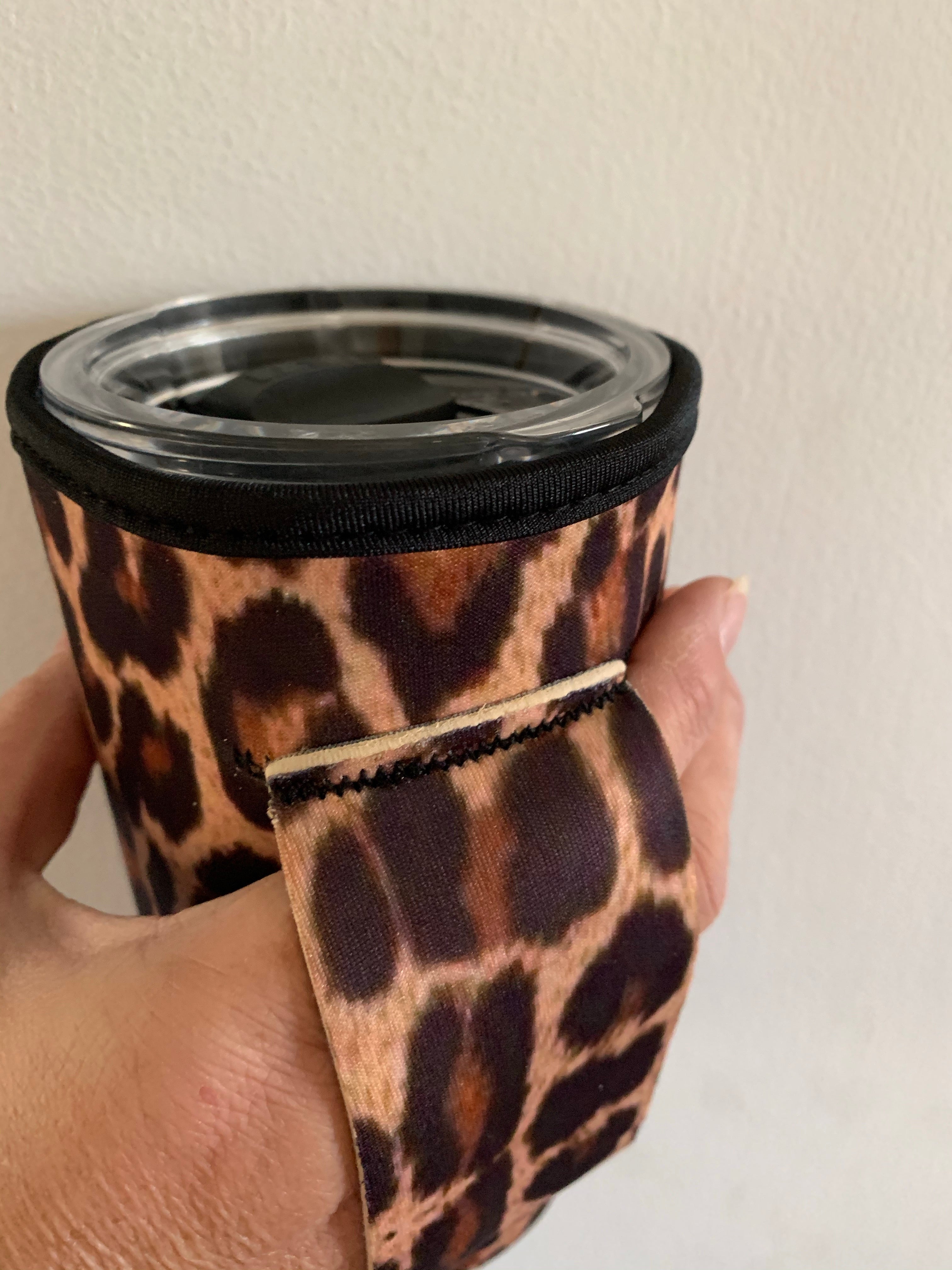 Leopard print slip on travel mug cover.  Fits 20 oz mugs