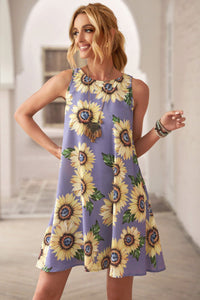 Beautiful purple sunflower print lightweight silky sundress. Classic tank dress design, round neck and sleeveless. Casually cool for hot summers!