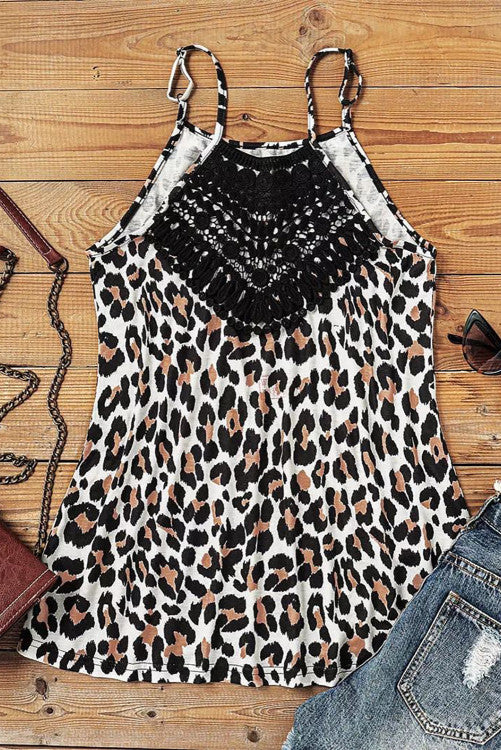 Beautiful black lace accented neckline, with brilliant leopard print halter tank. Nice lightweight knit fabric that is soft and comfortable on those warm sunny days. 