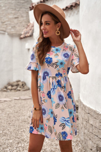 Pink and blue floral ruffled sleeve empire waist sundress. This beautiful colorful floral print dress is a must have this Summer. You can pair it with heels, wedges, or sandals. This tunic dress is such a flattering fit. Nice cotton blend knit fabric. Loose and comfy.