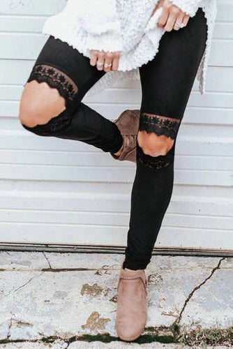 Nice stretchy black leggings with a lace trim cut out knee. Very roomy and stretchy! **Run at least one size bigger!** Nice silky soft fabric.