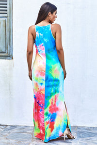 Shine in the crowd with this neon multicolor tie-dye maxi dress. The trendy tie-dye print is fashionable and beautiful. Has sleeveless high neck design, flattering fit and floor-length hemline with double side slits.
