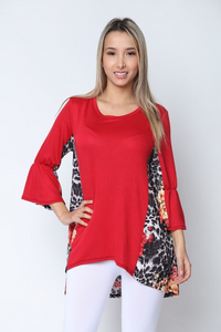 This poly knit tunic is so beautifully made. It can be paired with so many bottoms. Is stretchy and is so figure flattering!  Made in the USA!  