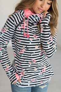 Black Stripes w/Pink Floral Print.  Double hoods, inside hood pink and outside hood floral.  Lightweight silky soft poly/cotton fabric.  Asymmetrical Zip At Shoulder.   Fits like a shirt should fit, not a baggy sweatshirt.    