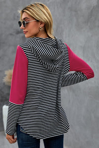 We love a good hoodie that you can layer with, especially as the weather is only going to get cooler.  •This is a great transition piece as you can wear alone and then add a cute coat later on for extra warmth.  •Flattering fit striped print, solid color accent on sleeves.