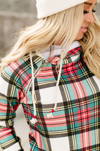 Holiday colored plaid pattern double hooded hoodie. Cowl neck with off to the side drawstring with asymmetrical zip, had with thumb hole at cuffs. Outer hood is holiday plaid pattern, with inside hood a solid white. Super soft cotton blend fabric.    
