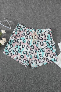 These leopard print shorts are so trendy and cute!! Beautiful pastel colors with elastic waist and drawstring are designed for easy everyday wear. Has side pockets for you to keep essentials. The comfy and lightweight fabric is perfect for summer. These are roomy! Could size down! 