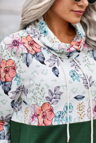This sweatshirt is the cutest way to stay comfortable and cozy this Fall and Winter.  •Its cowl neck detail adds a fun element and the soft material will keep you cozy warm.  •Features new trending fresh floral print splicing with solid color.  •The long sleeves have a thumb hole design for extra warm and comfort.  •True to Size 