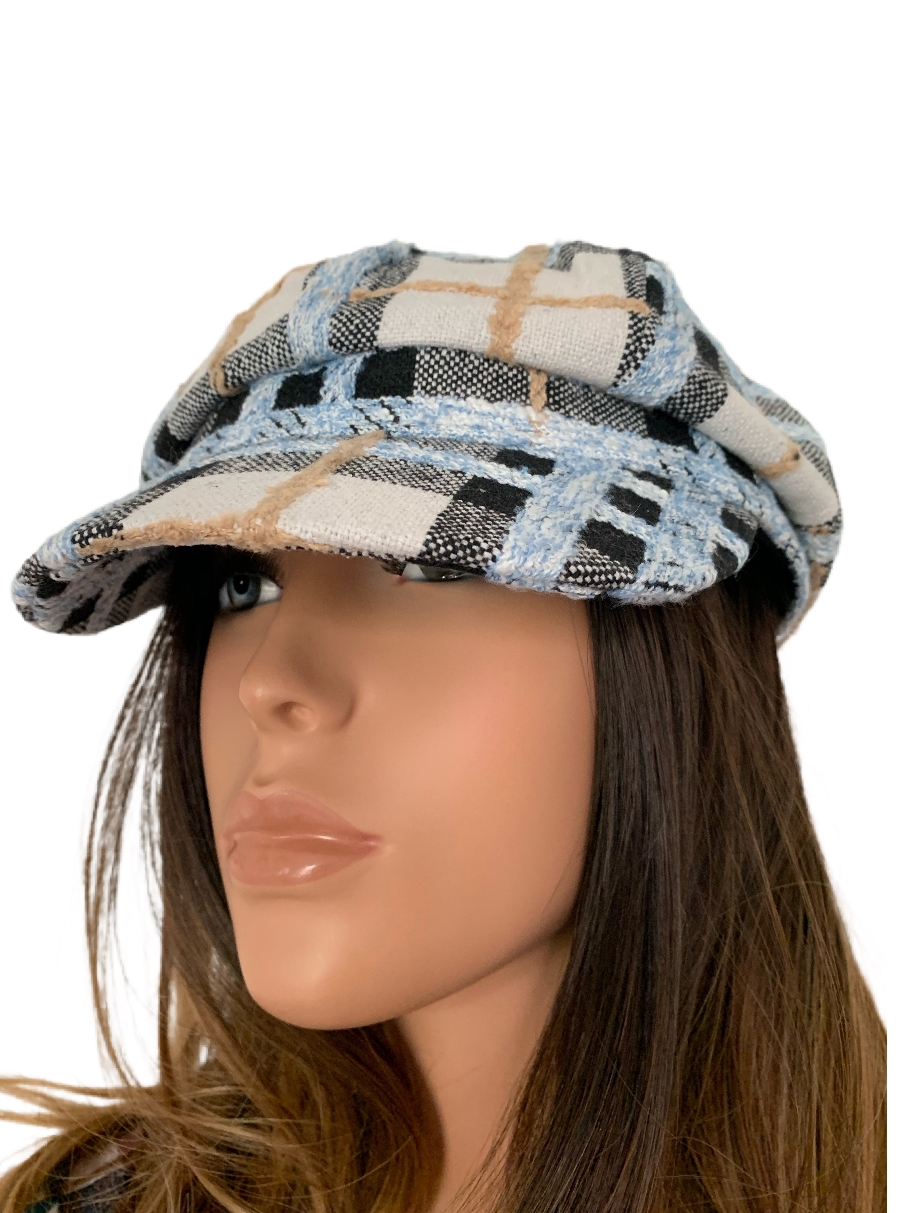 Blue, black and white plaid tweed hat. Is adjustable. This is a high quality hat. One size