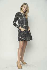 Beautiful plaid tunic with pockets. Wear it as a dress or wear as a top!  Made of a thicker knit fabric. True to size fit.