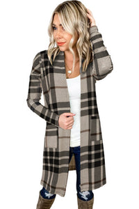 Khaki tartan plaid long sleeved cardigan, open front style with no buttons or zip. Length is longer, almost to above knee. Thicker knit material for warmth and comfort. Sizes Small, medium, large, extra large, 2X. $34.00