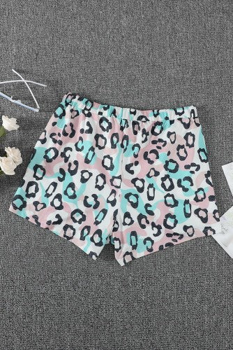 These leopard print shorts are so trendy and cute!! Beautiful pastel colors with elastic waist and drawstring are designed for easy everyday wear. Has side pockets for you to keep essentials. The comfy and lightweight fabric is perfect for summer. These are roomy! Could size down! 