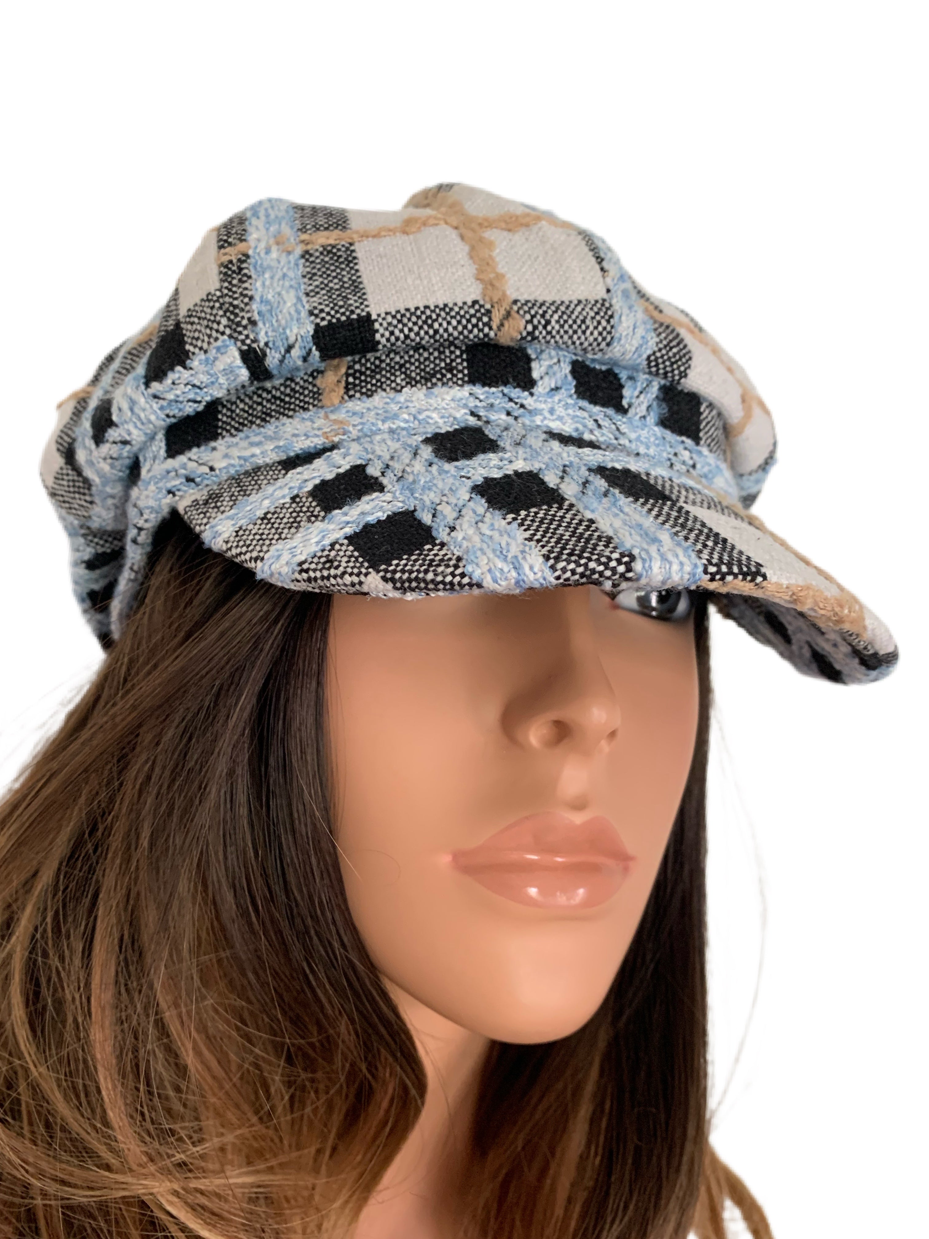Blue, black and white plaid tweed hat. Is adjustable. This is a high quality hat. One size