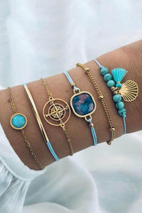 Turquoise beaded. gold chain, and strings adjustable bracelet set. Contains 6 pieces. Can be worn separate, all together, or any way you want to wear them!