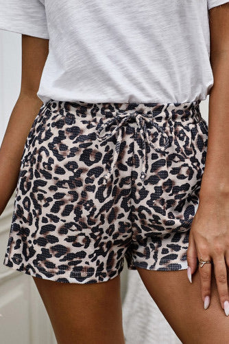 Stylish trendy leopard print casual shorts with drawstring tie. Functional sides pockets and elastic waist make these shorts easy and comfy to wear. Cotton blend with slight. A great choice for casual wear, night out on the town, daily lounging, camping vacation or to the beach! Where them anywhere! 