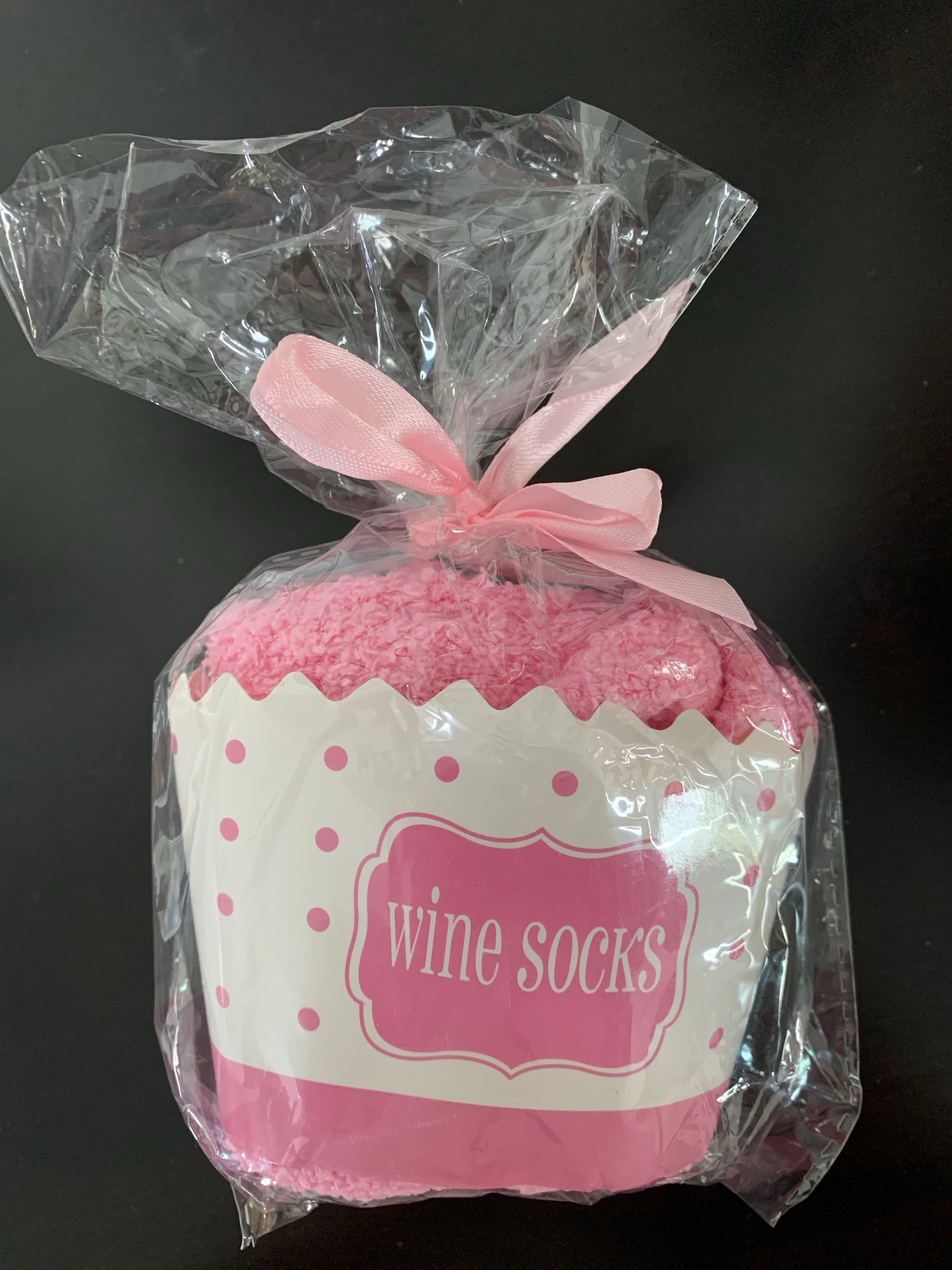 Pink Bring Me Wine Cotton Socks  Pink poly cotton socks, to give as a gift or keep for yourself!  Comes in a cute cupcake looking package. 