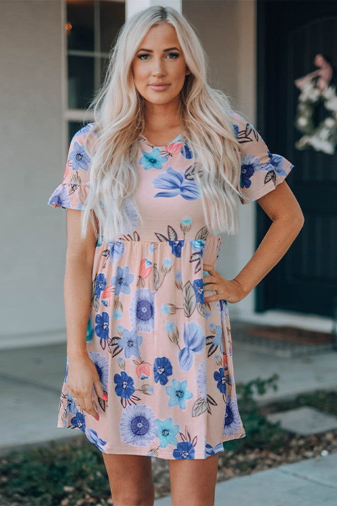 Pink and blue floral ruffled sleeve empire waist sundress. This beautiful colorful floral print dress is a must have this Summer. You can pair it with heels, wedges, or sandals. This tunic dress is such a flattering fit. Nice cotton blend knit fabric. Loose and comfy.