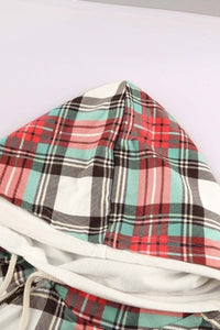 Holiday colored plaid pattern double hooded hoodie. Cowl neck with off to the side drawstring with asymmetrical zip, had with thumb hole at cuffs. Outer hood is holiday plaid pattern, with inside hood a solid white. Super soft cotton blend fabric.    
