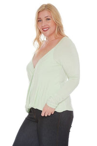 PASTEL GREEN LONG SLEEVE WRAP PLUS SIZE TOP  Lightweight stretchy knit .  Very roomy in bust area!!  Style is a snugger fit stretch knit   Made in the USA