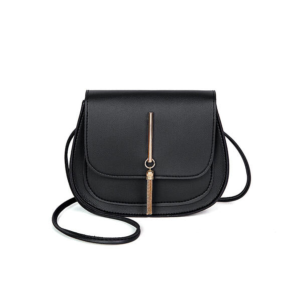 Black cross body purse. Perfect size for all necessary essentials like cell phone, lipstick and money for a night out, shopping, or a special occasion. Size is 6 x 7 ". Made of PU, with polyester lining and has a magnetic closure. Strap is approximately 46" long.