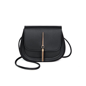 Black cross body purse. Perfect size for all necessary essentials like cell phone, lipstick and money for a night out, shopping, or a special occasion. Size is 6 x 7 ". Made of PU, with polyester lining and has a magnetic closure. Strap is approximately 46" long.