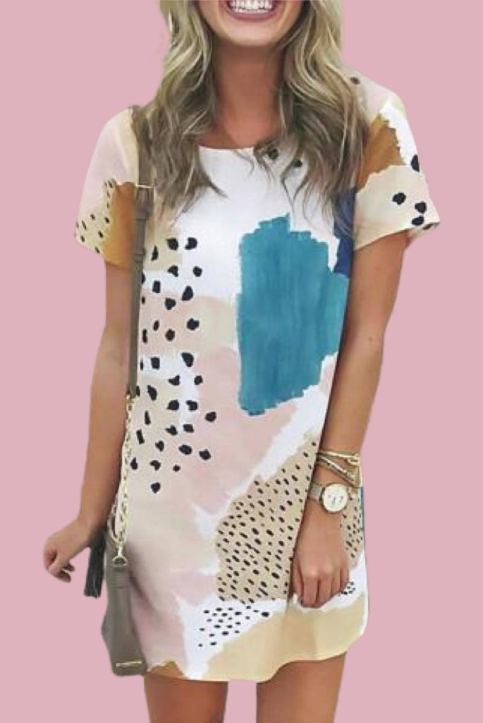 Casual colors of teal blush and browns gives this mini dress a fresh spring look. The subtle leopard prints and patchwork look print are so trendy and just plain cool looking! Has round neck and short sleeves and has straight down with somewhat of a flared hem for room and comfort! Super soft cotton knit blend fabric. 