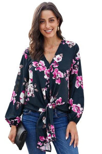 •Casual loose fit with long sleeves  • V-neck and a front tie at the bottom  •Beautiful print pattern silky blouse  •Pair with denim skinnies and heels to complete your look  •Very roomy top, could downsize if you don’t need the bust room! 