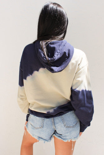 Navy and cream tie dye look hooded sweatshirt with kangaroo front pocket. Perfect for cool nights and fall and winter seasons. Outer has a smooth silky poly knit feel. Runs according to size guide. This is roomy for sizes. 