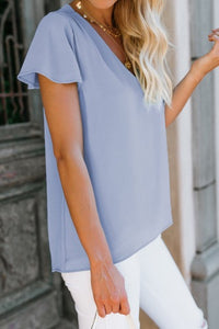 Unique ruched shoulder design is fascinating  •Flutter short sleeve, regular fit shape and hi-lo hem  •You can match it with leggings, jeans or casual pants  Nice silky feel textured blouse    