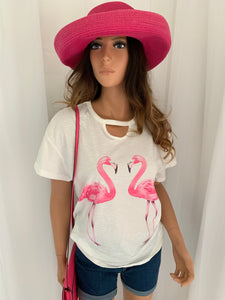 Super cute white tee with pink flamingos  •Chic hollow-out neck  •Crew neck  •Short sleeves  •Front flamingos print  •Classic tee fit  Note: Not a very stretchy material and is a nice  cotton blend fabric 