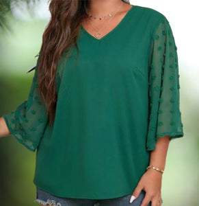 Beautiful emerald green curvy size blouse with Swiss dot lace 3/4 bell sleeve and V-Neck style. Lightweight silky polyester blend fabric. Great top to wear out or to the office. Roomy blouse. 