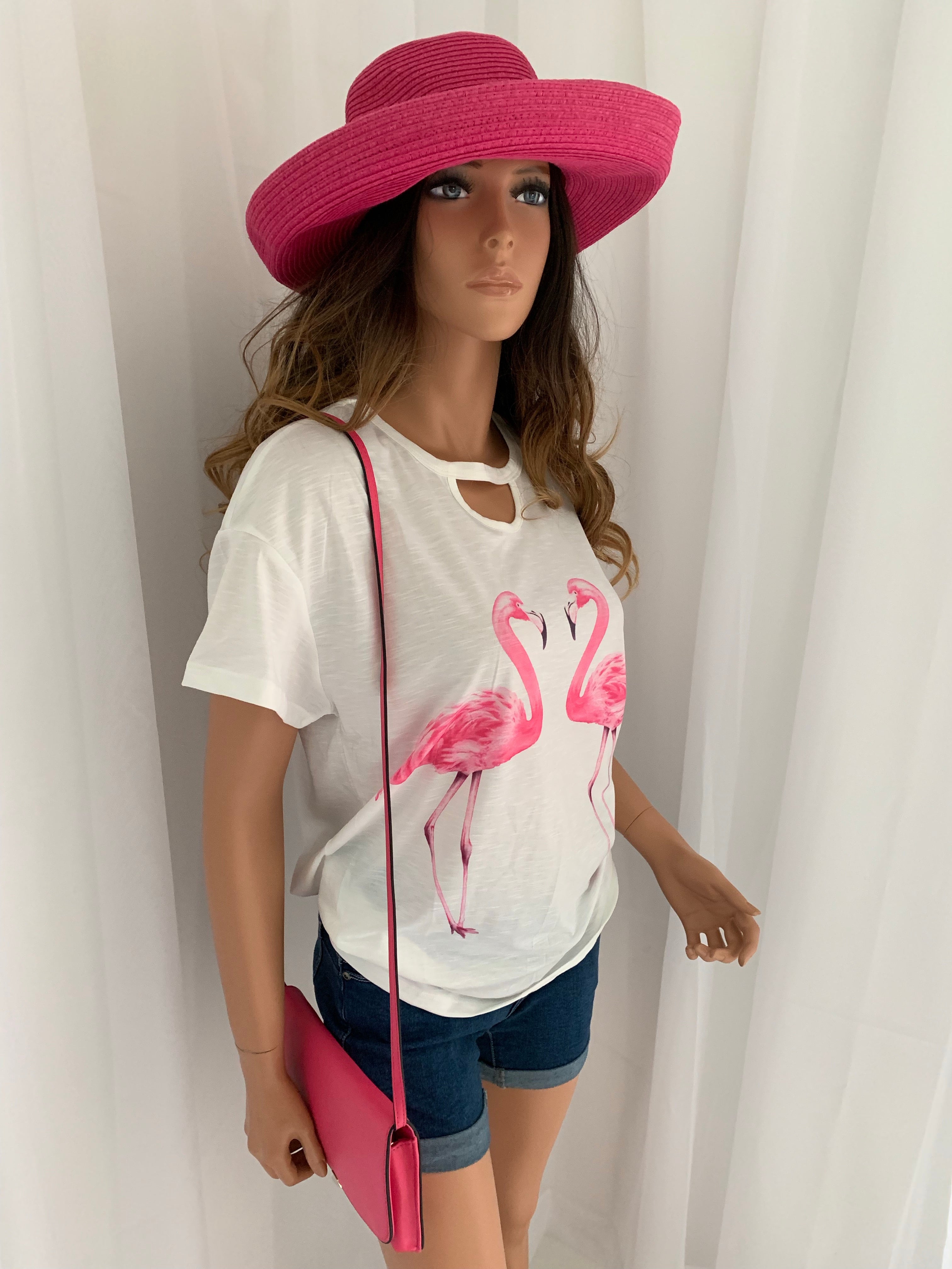 Super cute white tee with pink flamingos  •Chic hollow-out neck  •Crew neck  •Short sleeves  •Front flamingos print  •Classic tee fit  Note: Not a very stretchy material and is a nice  cotton blend fabric 