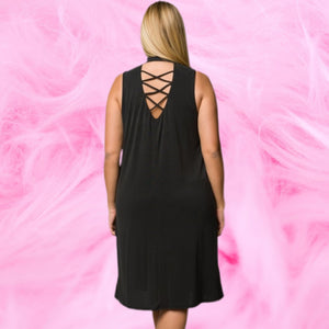 Black jersey knit criss cross back sleeveless dress. Color is a faded black. Dress Is fully lined. Fits according to size guide. Is roomy for sizes. Made in the USA. 