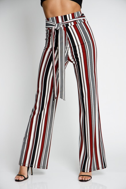 Burgundy Multi Colored Striped Pants.  Nice stretch and long!   These make you look long and lean!   100% Polyester  Runs according to size guide, are stretchy so they have some extra room when sizing. 
