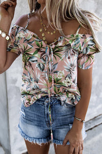 Mauve Floral print strappy ruffly blouse. The spaghetti strap and cold shoulder highlights neck and shoulder. Ruffled design makes this cool and casual top trendy and stylish. Lace-up design adds some extra flair. Nice cool silky feel flowy fabric. Perfect for Spring and Summer. 