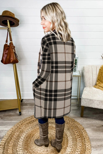 Khaki tartan plaid long sleeved cardigan, open front style with no buttons or zip. Length is longer, almost to above knee. Thicker knit material for warmth and comfort. Sizes Small, medium, large, extra large, 2X. $34.00