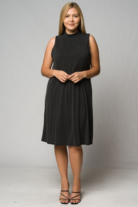 Black jersey knit criss cross back sleeveless dress. Color is a faded black. Dress Is fully lined. Fits according to size guide. Is roomy for sizes. Made in the USA. 