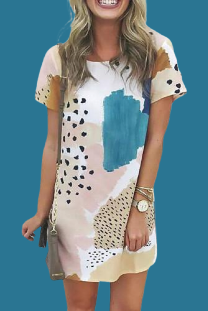 Casual colors of teal blush and browns gives this mini dress a fresh spring look. The subtle leopard prints and patchwork look print are so trendy and just plain cool looking! Has round neck and short sleeves and has straight down with somewhat of a flared hem for room and comfort! Super soft cotton knit blend fabric. 