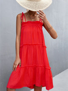Super cute beautiful red ruffly tiered sun dress with shoulder tie straps. Nice and roomy, lightweight flowy dress that is perfect for hot sunny days. 