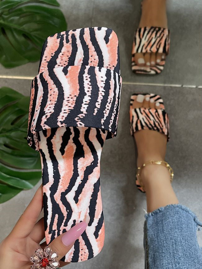 Pink zebra print sandals are a must have this summer! Nice soft silky fabric covered upper with a sturdy rubber bottom. 