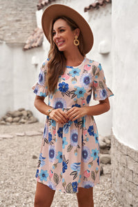Pink and blue floral ruffled sleeve empire waist sundress. This beautiful colorful floral print dress is a must have this Summer. You can pair it with heels, wedges, or sandals. This tunic dress is such a flattering fit. Nice cotton blend knit fabric. Loose and comfy.