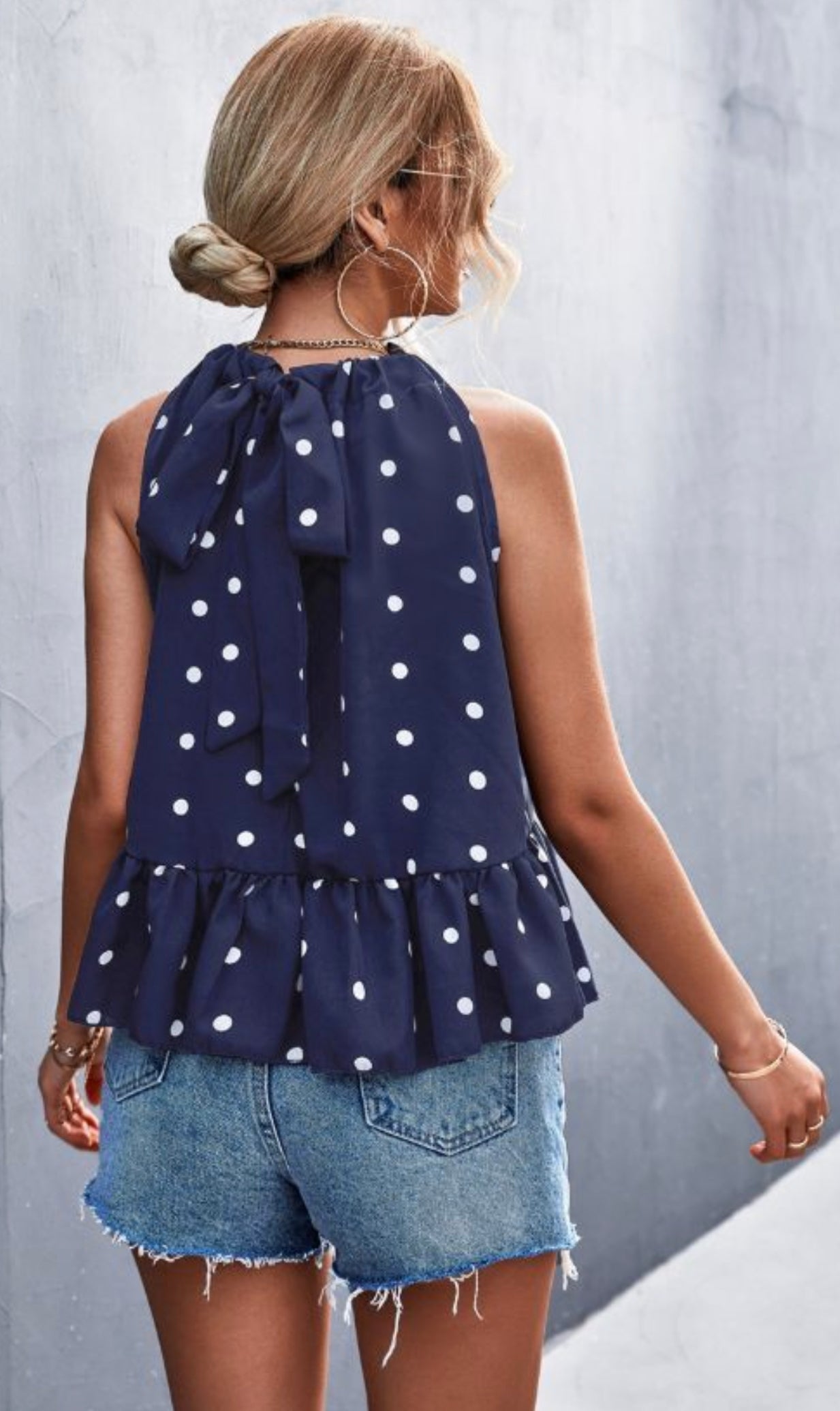 Navy blue polka dot ruffly babydoll halter top. Silky smooth lightweight fabric, perfect for warm weather. 