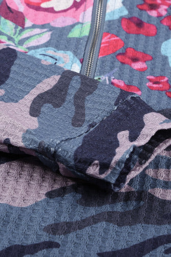 Camo has never been this cute!  •This camo pullover has a front pocket and a quarter zip  •The pink flowers are bright and fun  •This pullover is more fitted -follow size guide below   •Made of a waffle knit fabric, this is a great top to wear on casual days with friends or on "Jeans" Fridays.