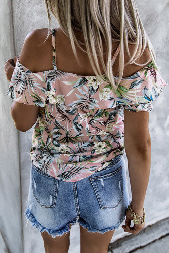 Mauve Floral print strappy ruffly blouse. The spaghetti strap and cold shoulder highlights neck and shoulder. Ruffled design makes this cool and casual top trendy and stylish. Lace-up design adds some extra flair. Nice cool silky feel flowy fabric. Perfect for Spring and Summer. 