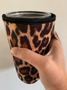 Leopard print slip on travel mug cover.  Fits 20 oz mugs