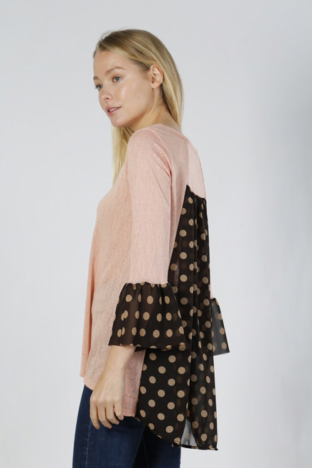 This Pink Polka Dot tunic is so cute and flowy. Made of cotton knit fabric, that’s airy and loose. Has a sheer like back. Pair this any type of bottom to create casual or dressy looks.  Made in the USA! 
