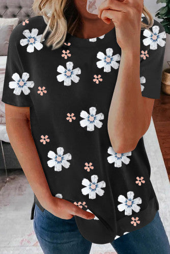 Solid black knit tee with daisy print. This tee is soft, lightweight and airy, very comfy to wear. Round neck, short sleeve, loose fit with side slits. This short sleeve tee is perfect for any summer occasion. Pair it with our daisy shorts and jeans! Runs True to Size.
